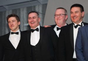 The team accepting the Innovation Award