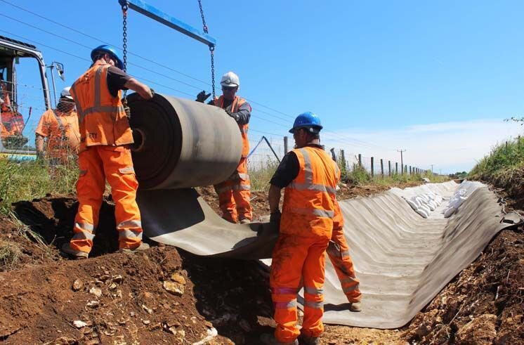 Channel lining bulk roll deployment